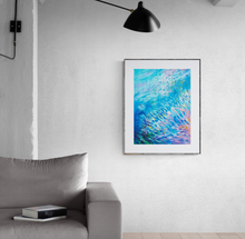 Load image into Gallery viewer, Marine life art print by Grace Marquez displayed on white wall  with wall lamp above it and sofa below it
