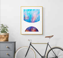 Load image into Gallery viewer, Art print called "Bubbles Jellyfish Dance" by underwater artist Grace Marquez matted and framed on the wall of a hallway with a bicycle and hall table.