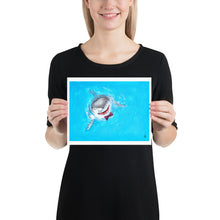 Load image into Gallery viewer, Woman holding a print illustration of a great white shark wearing a bowtie.