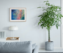 Load image into Gallery viewer, &quot;Circling&quot; art print displayed on wall of bright living room with large plant