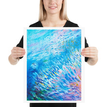 Load image into Gallery viewer, Woman holding 16 by 20 inch art print of blue, white and pink Marine Life