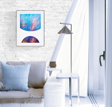 Load image into Gallery viewer, Art print called &quot;Bubbles Jellyfish Dance&quot; by underwater artist Grace Marquez matted and framed on a white painted brick wall in a bright airy living room.