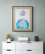 Load image into Gallery viewer, Art print of underwater scene with jellyfish by Grace Marquez titled &quot;Bubble: Tentacles Reaching&quot; displayed on the wall above a contemporary white dresser
