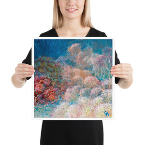 Woman holding square reef art print by Grace Marquez in 16 x 16 inches